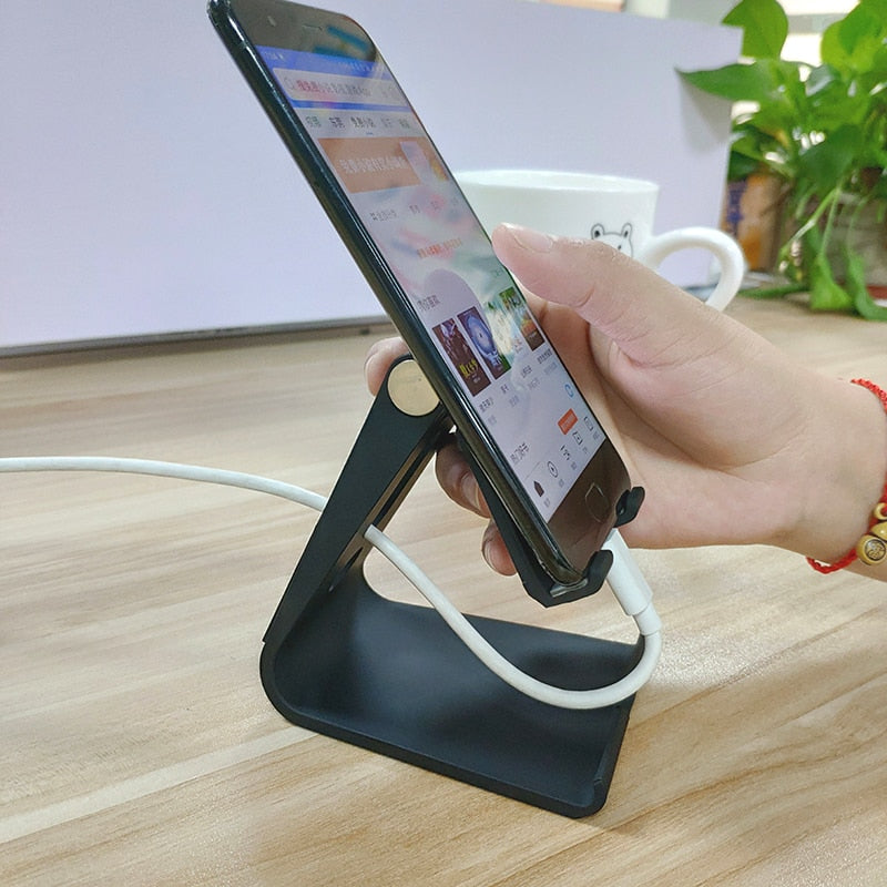 Rotating tablet flexible phone holder